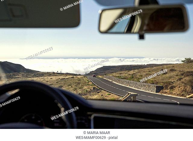 Spain, Canary Islands, La Gomera, view out of a windscreen to a cloud cover over the Atlantic