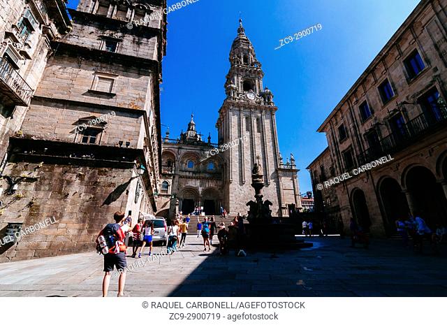 Berenguela tower of the Cathedral of Santiago and Santiago de Compostela statue and fountain in Praterías square