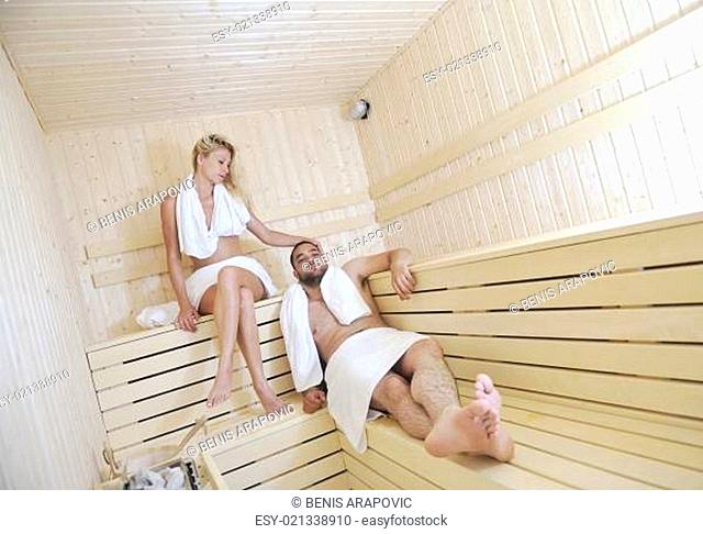 happy young couple in sauna