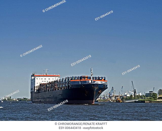 Nearly Empty Container Ship leaving the Port of Hamburg, Germany