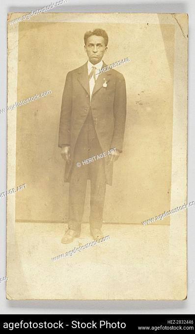 Photographic postcard of a man in a suit, 1904-1918. Creator: Unknown