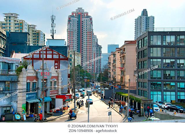 SHANGHAI, CHINA - DEC 27, 2017: View of Shanghai street on the day. Shanghai is the most populous city in the world, with a population of more than 24 million