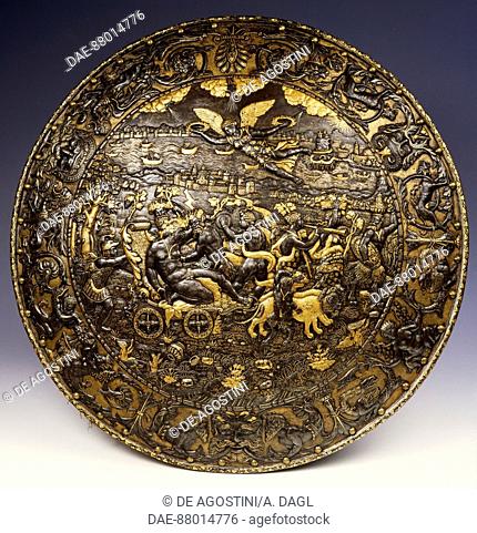 Rotella (round parade shield) decorated with the triumph of Bacchus, 17th century.  Brescia, Castello-Mastio Visconteo Museo Civico Delle Armi Luigi Marzoli...