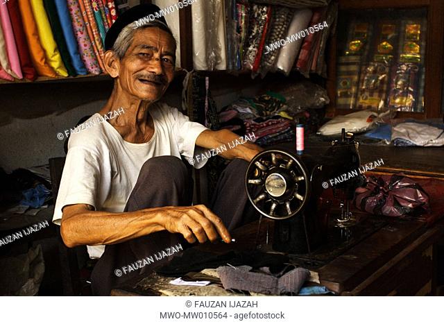 Portrait of an old tailor in Lamno, Aceh Jaya, Indonesia July 1, 2007