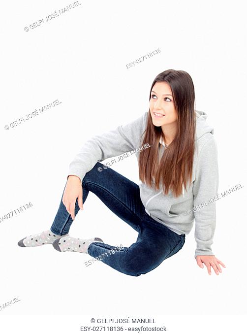 Happy girl with grey sweatshirt isolated on a white background