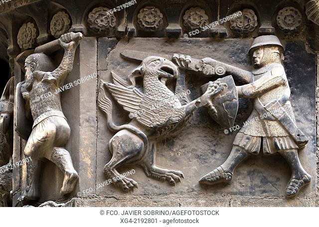 Spain, Catalonia, Barcelona, Cathedral, Relief in Sant Iu Portal. Knight fighting Griffin