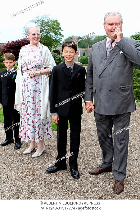 Danish Queen Margrethe with Prince Felix (l) and Prince Consort Henrik with Prince Nikolai (r), the sons of Prince Joachim