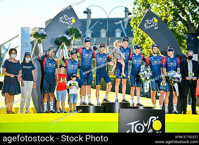 Ineos Grenadiers riders celebrate on the podium of stage 21, the final stage of the Tour de France cycling race, from Paris la Defense Arena to Paris...