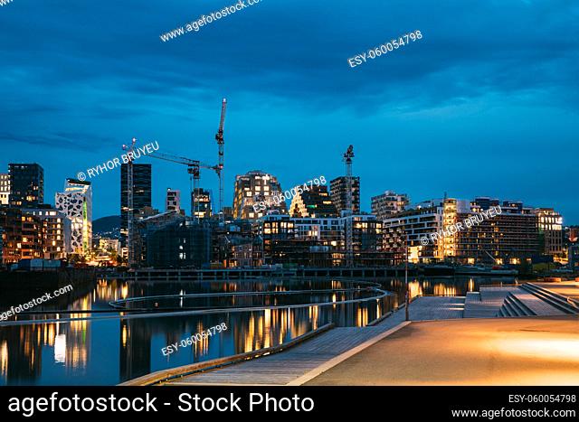 Oslo, Norway. Night View Embankment And Residential Multi-storey House On Sorengkaia Street In Gamle Oslo District. Summer Evening