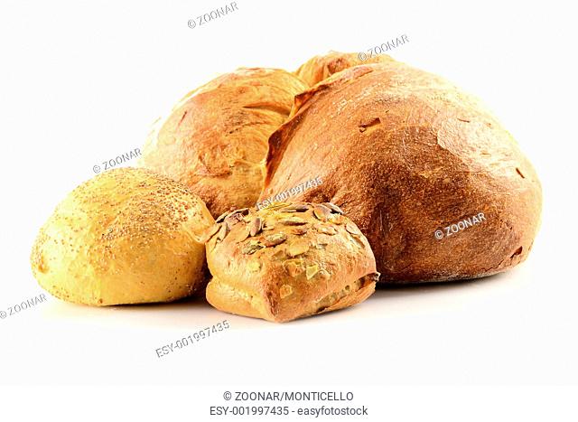 Composition with bread and rolls on kitchen table