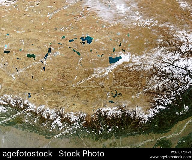 EARTH Great Himalayan Range / Tibetan Plateau -- 27 Oct 2002 -- The Himalayan Mountain Range runs a curving path from west to east in this true-color Terra...