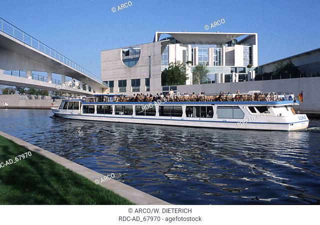 Pleasure boat on river Spree in front of Chancellery Berlin Germany