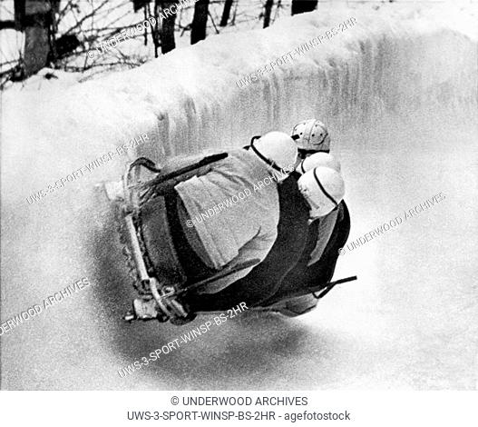 Lake Placid, New York: February 14, 1961 .The USA Bobsled team, lead by Fred Fortune, negotiates a tough corner along the slopes of Mt