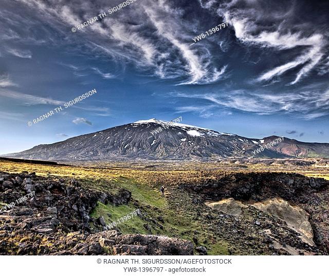 Lava and moss landscape with Snaefellsjokull Glacier in background, Snaefellsnes Peninsula, Iceland