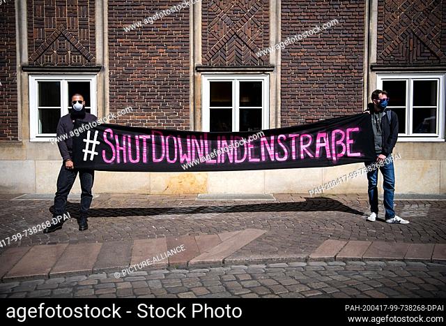 17 April 2020, Bremen: Demonstrators hold a poster with the inscription ""Shut Down Lindenstraße"". During a demonstration