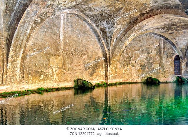 The arches and the pool of Fonte Branda - Siena, Tuscany Italy