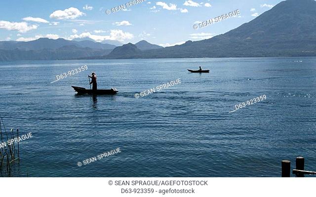 Guatemala. Lake Atitlan, from San Marcus La Laguna. Fishermen in canoes