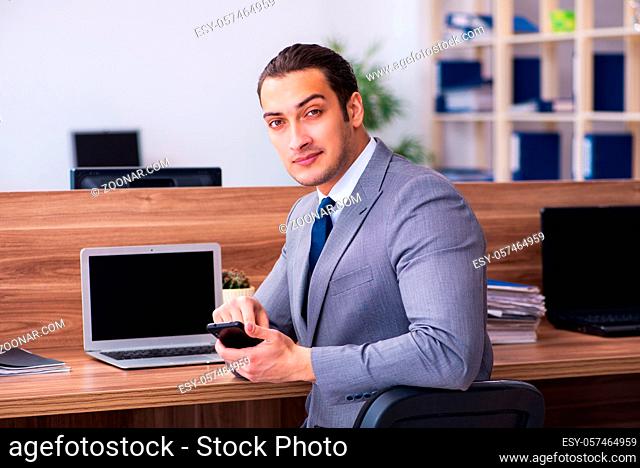 Male employee working in the office