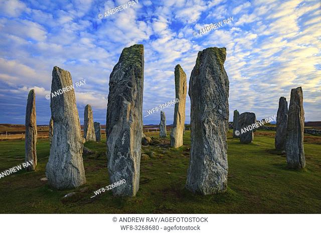 The Neolithic Stone Circle at Callanish on the Isle of Lewis bathed in late afternoon light in October