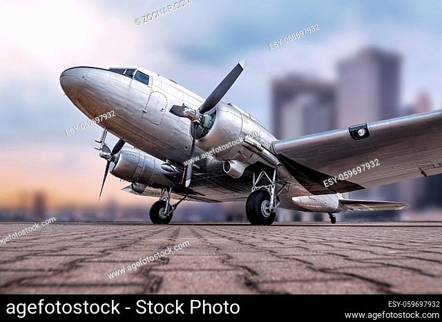 historical airplane against a skyline
