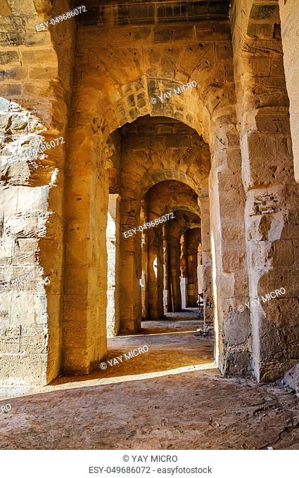Corridor in ruins of the largest coliseum in North Africa. El Jem, Tunisia, UNESCO