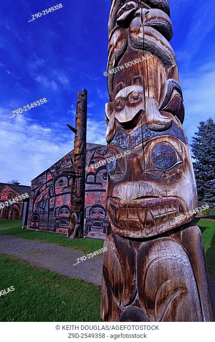 Totem pole and long houses at Ksan Historical Village and Museum, Hazelton, British Columbia