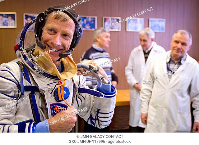 NASA astronaut Chris Ferguson, STS-135 commander, undergoes a fit check of his Sokol spacesuit at the Zvezda facility in Moscow, Russia on March 29, 2011