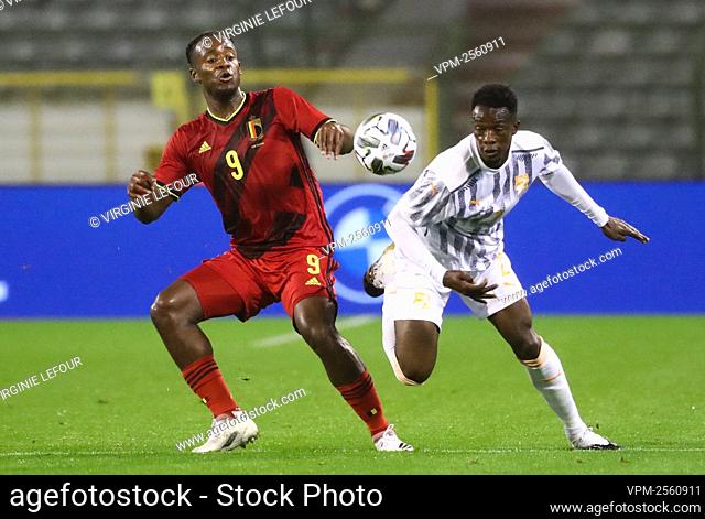 Belgium's Michy Batshuayi and Ivory Coast Sinaly Diomande fight for the ball during a friendly game between the Belgian national soccer team Red Devils and...