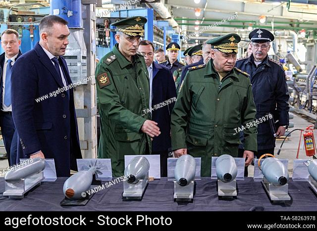 RUSSIA, NIZHNY NOVGOROD REGION - APRIL 6, 2023: Russia's Defence Minister Sergei Shoigu (R front) checks regional enterprises to ensure the fulfilment of the...