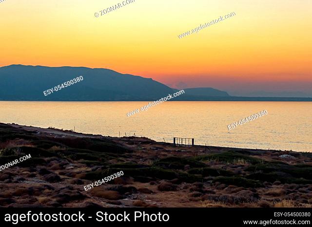 Sunset on the sea near the village of Sissi in Crete