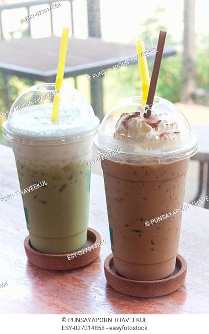 Iced coffee with iced green tea in coffee shop, stock photo
