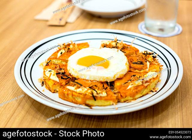 Okonomiyaki, Japanese Pizza on the wooden table
