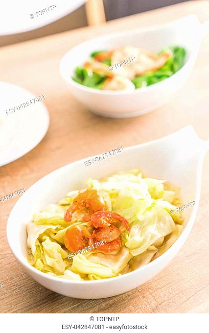 Stir fried Cabbage with Fish sauce on plate