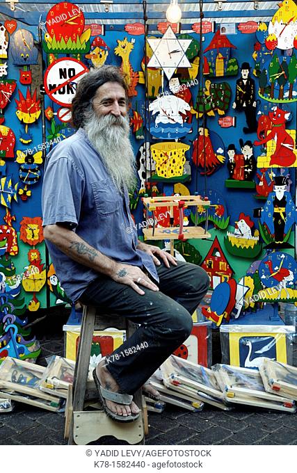 Portrait of Norman Mathews, an artist who sells his cratf at the crafts market in Nachalat Binyamin Street, Tel Aviv, Israel