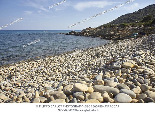 Punta Molentis beach in southern Sardinia: A white pebble beach surrounded by nature and a pristine landscape