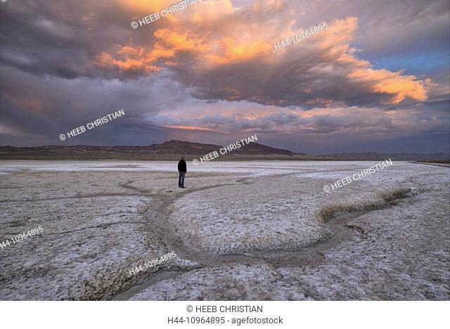 USA, United States, America, Nevada, Fallon, Highway 50, loneliest road, outback, road, american west, desert, salt flat, pan, person, red clouds, storm, stormy