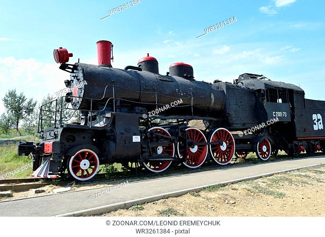 The old steam locomotive in open air museum. Oldtimer. Translation of the inscription: on the exhibits do not get involved
