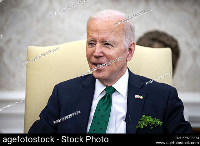 U.S. President Joe Biden speaks while meeting virtually with Micheal Martin, Ireland's prime minister, not pictured, in the Oval Office of the White House in...