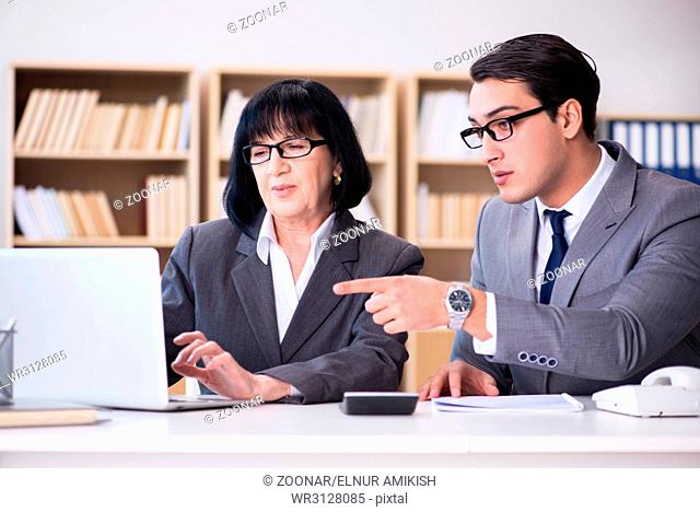The business couple having discussion in the office