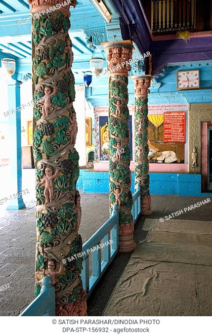 Inside view ; carved and painted wooden pillars at Sopandev tomb temple at Sasvad village ; taluka Purandar ; district Pune ; Maharashtra ; India