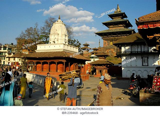 People walking over Durbar Square with many temples Kathmandu Nepal