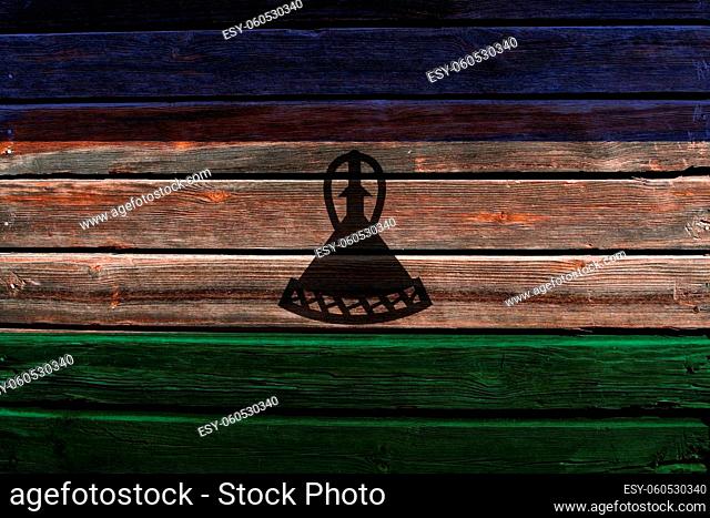 3D Flag of Lesotho on a old wood wall background