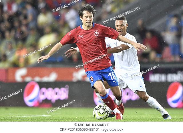 Tomas Rosicky of Czech Team and Kieran Gibbs of TR10 World Team in action during the match. Former captain of the Czech national football team Tomas Rosicky...