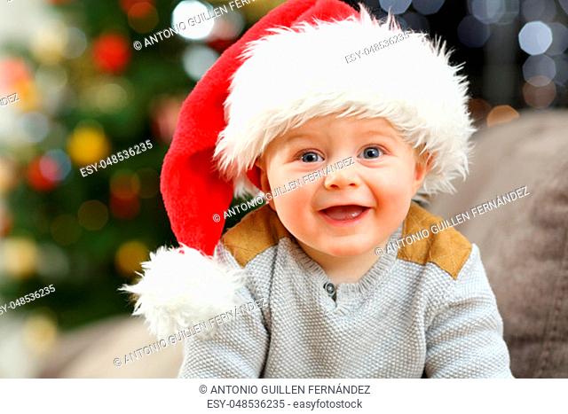 Cheerful baby looking at you in christmas