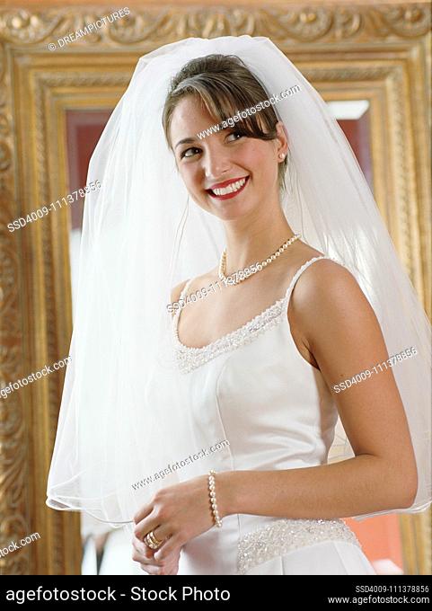 Bride smiling for the camera