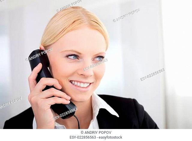 Beautiful businesswomen talking on the phone