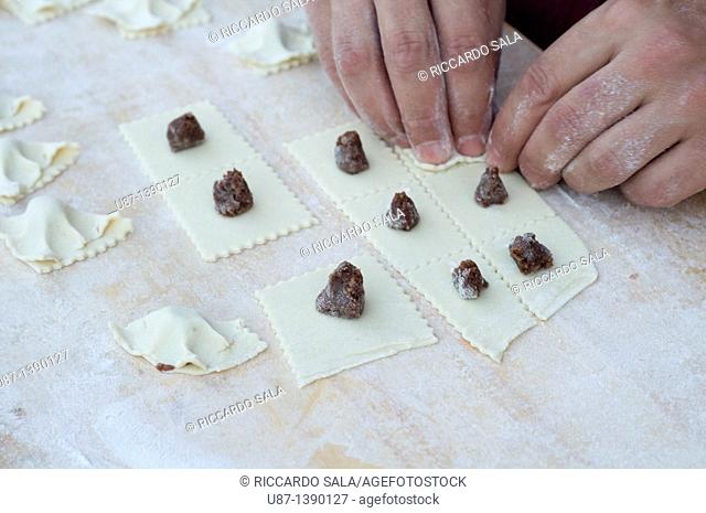 Italy, Lombardy, Crema, Hand Making Tortello Cremasco, Sweet Ravioli Filling the Parmesan Cheese, Amaretti Biscuit, Raisins, Mostaccino Biscuit, Candied Citron