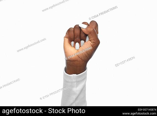 hand of african american woman showing fists