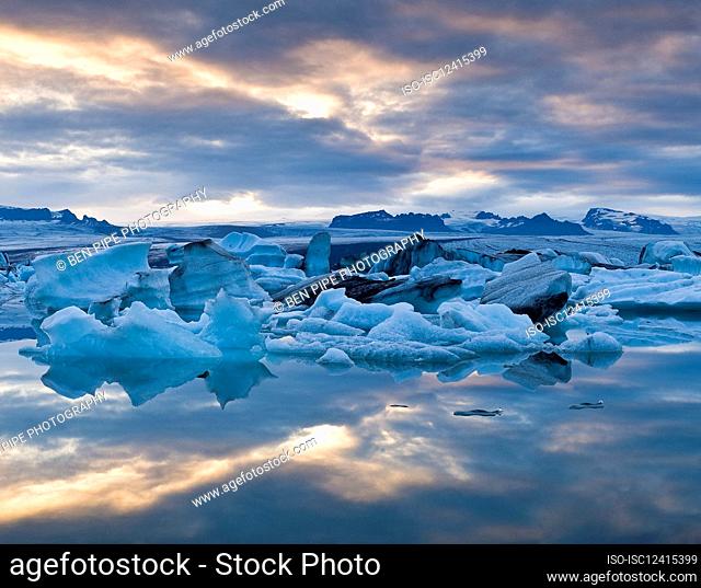Iceland, Icebergs on Jokulsarlon glacial lake at sunset
