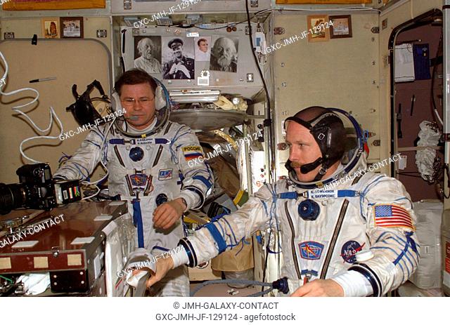 Attired in their Russian Sokol suits, astronaut Kenneth D. Bowersox (right), Expedition Six mission commander, and cosmonaut Nikolai M